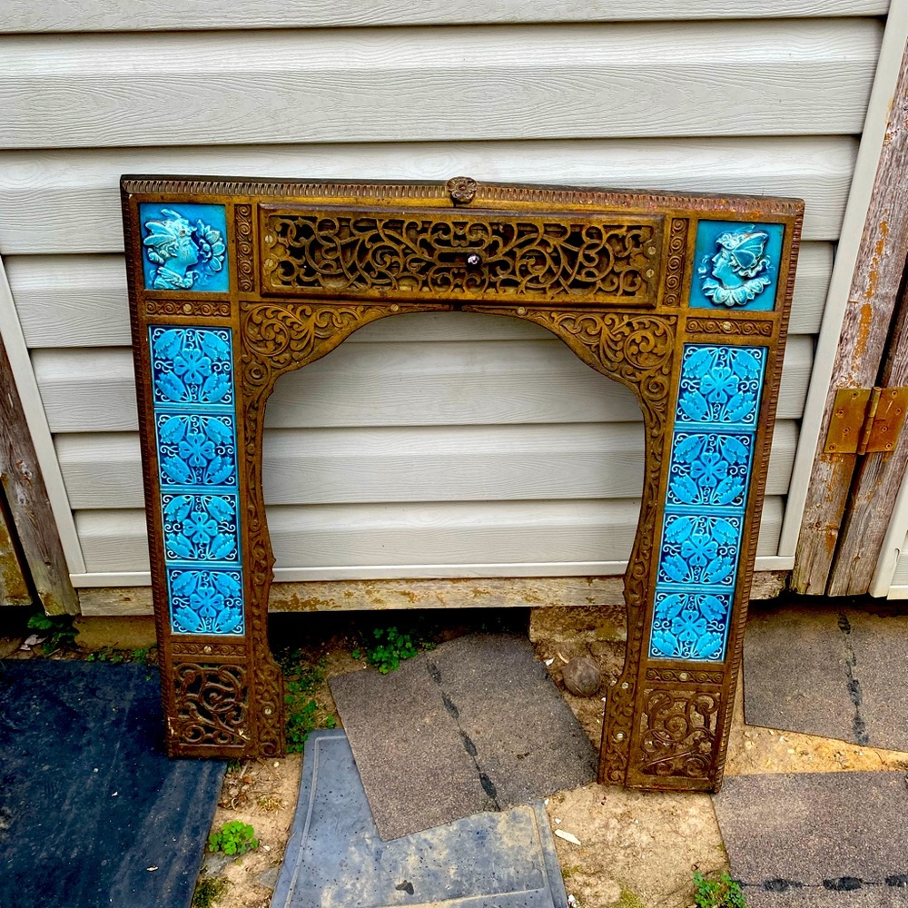 Metal with porcelain tiles fireplace cover